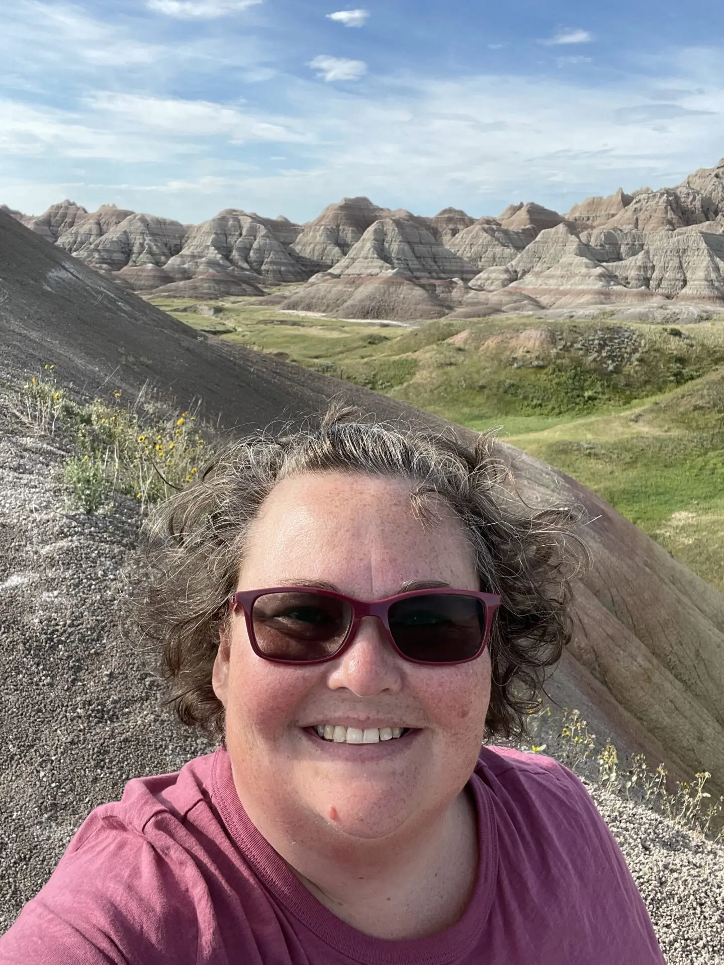 Photo of Jennifer Legat, with mountains in the background